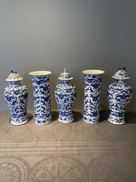 A Chinese blue and white garniture of five vases with lotus scrolls, 19th C.