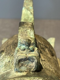 Three Chinese archaic bronze wine vessels, Zhou or later