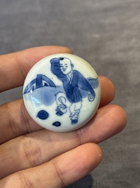 A Chinese blue and white tea caddy and cover with a lady and playing boys, Kangxi