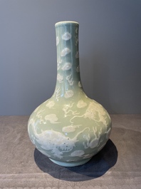 A Chinese celadon-ground slib design 'dragon' vase and Chinese blue and white vase or incense container, 19th C.