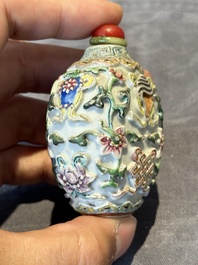 Six Chinese famille rose moulded snuff bottles, Qianlong mark, 19/20th C.