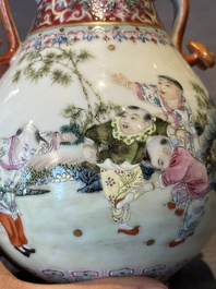 A Chinese famille rose 'hu' vase with playing boys, Qianlong mark, 20th C.