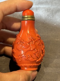 Four Chinese Peking glass snuff bottles, one with a Qianlong mark, 18/19th C.