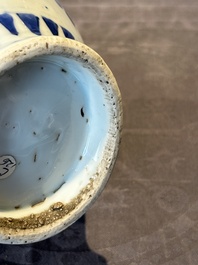 A Chinese blue and white vase with floral design and two handles, Transitional period