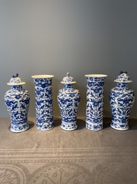 A Chinese blue and white garniture of five vases with lotus scrolls, 19th C.