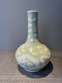 A Chinese celadon-ground slib design 'dragon' vase and Chinese blue and white vase or incense container, 19th C.