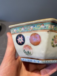 A Chinese blue, white and famille rose tea service, three famille rose bowls, a plate and a covered jar, 19th C.