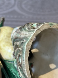 A pair of Chinese verte biscuit parrots, 19th C.