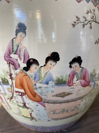A Chinese famille rose jardiniere with ladies in a garden, 20th C.
