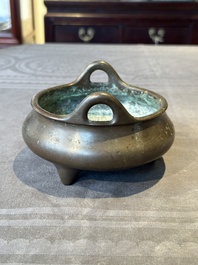 A Chinese bronze tripod censer, Guan Huai Tang Zhu Ren 冠槐堂主人 mark, 17/18th C.