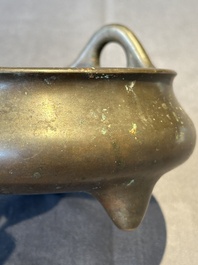 A Chinese bronze tripod censer, Guan Huai Tang Zhu Ren 冠槐堂主人 mark, 17/18th C.