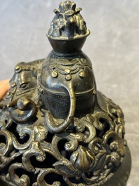 A fine Chinese tripod 'elephant' censer and cover, Ming