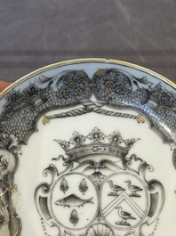 A Chinese gilt-decorated grisaille armorial cup and saucer, Qianlong
