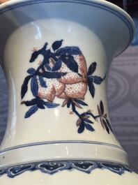 A Chinese blue, white and copper-red 'Three abundances' or 'Sanduo' vase, 19/20th C.