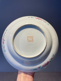 A Chinese blue, white and famille rose tea service, three famille rose bowls, a plate and a covered jar, 19th C.
