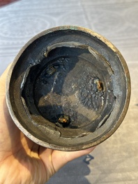 Two Chinese Chinese bronze cylindrical incense stick holders and a covered censer, Yuan/Ming and Qing