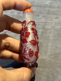 A group of six Chinese overlay glass snuff bottles, 19th C.