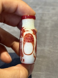 A group of six Chinese overlay glass snuff bottles, 19th C.