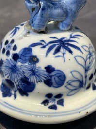 A Chinese blue and white garniture of five vases with lotus scrolls, 19th C.