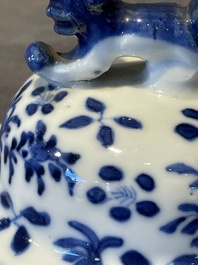 A Chinese blue and white garniture of five vases with lotus scrolls, 19th C.