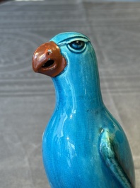 A pair of Chinese turquoise-glazed parrots, 19th C.