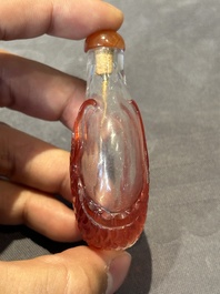 A group of seven Chinese red-overlay glass and red glass snuff bottles, 19/20th C.