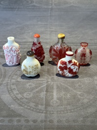 A group of six Chinese overlay glass snuff bottles, 19th C.