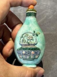 Six Chinese famille rose moulded snuff bottles, Qianlong mark, 19/20th C.
