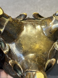 A fine Chinese tripod 'elephant' censer and cover, Ming