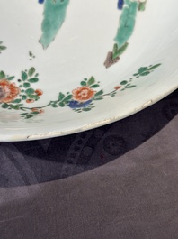 A Chinese famille verte 'leaping carps' dish, artemisia leaf mark, Kangxi