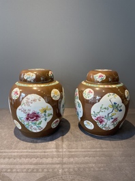 A pair of Chinese capucin-brown-ground famille rose covered jars with floral design, Yongzheng/Qianlong