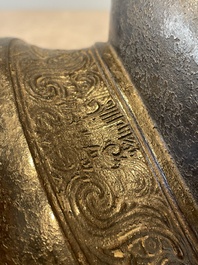 A pair of Chinese bronze 'hu' vases with Taotie design, Song/Yuan