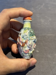 A Chinese famille rose moulded snuff bottle, Qianlong mark, late 18th/early 19th C.
