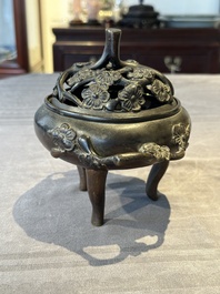Two Chinese Chinese bronze cylindrical incense stick holders and a covered censer, Yuan/Ming and Qing
