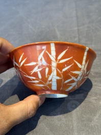 A Chinese coral-red-glazed bowl with reverse-decorated bamboo design, Xuantong mark and of the period