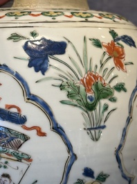 A Chinese famille verte 'figures and antiquities' jar and cover, Kangxi