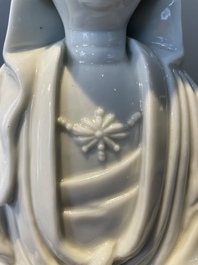 Two Chinese Dehua blanc de Chine figures of Guanyin, 18th C.