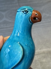 A pair of Chinese turquoise-glazed parrots, 19th C.