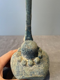 A group of seven bronze and pottery objects, Syria, Persia, and Luristan, 3rd C. and earlier