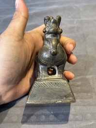 A large bronze sculpture and an opium weight in shape of Hintha or Hamsa, Burma/India, 17/18th C.