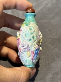 Six Chinese famille rose moulded snuff bottles, Qianlong mark, 19/20th C.