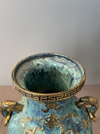 A pair of Chinese robin's egg and faux bronze-glazed 'hu' vases, Qianlong mark, 19th C.
