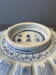 A rare Chinese lotus-shaped blue and white 'fu' dish, Kangxi mark and of the period