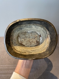 A pair of Chinese bronze 'hu' vases with Taotie design, Song/Yuan