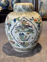 A Chinese famille verte 'figures and antiquities' jar and cover, Kangxi