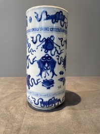 A Chinese celadon-ground slib design 'dragon' vase and Chinese blue and white vase or incense container, 19th C.