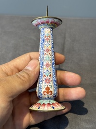 A pair of Chinese Canton enamel candlesticks with floral design, Yongzheng/Qianlong