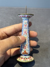 A pair of Chinese Canton enamel candlesticks with floral design, Yongzheng/Qianlong