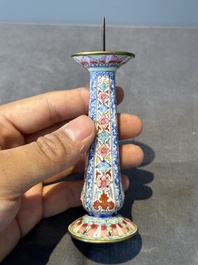 A pair of Chinese Canton enamel candlesticks with floral design, Yongzheng/Qianlong