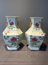 A pair of hexagonal Chinese famille rose 'hu' vases with floral design, Qianlong/Jiaqing